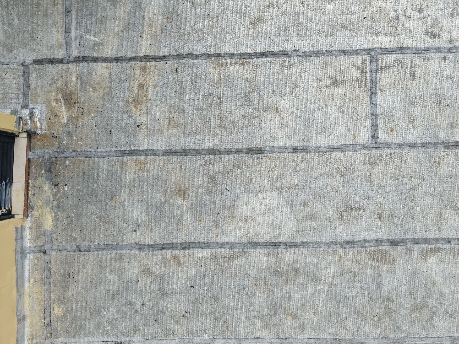 Detalle de la superficie del manto asf&aacute;ltico